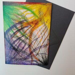Abstract colorful card on black envelope